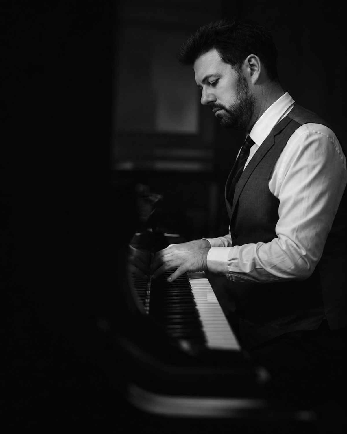 Adam Gravelle at the piano during his musical journey
