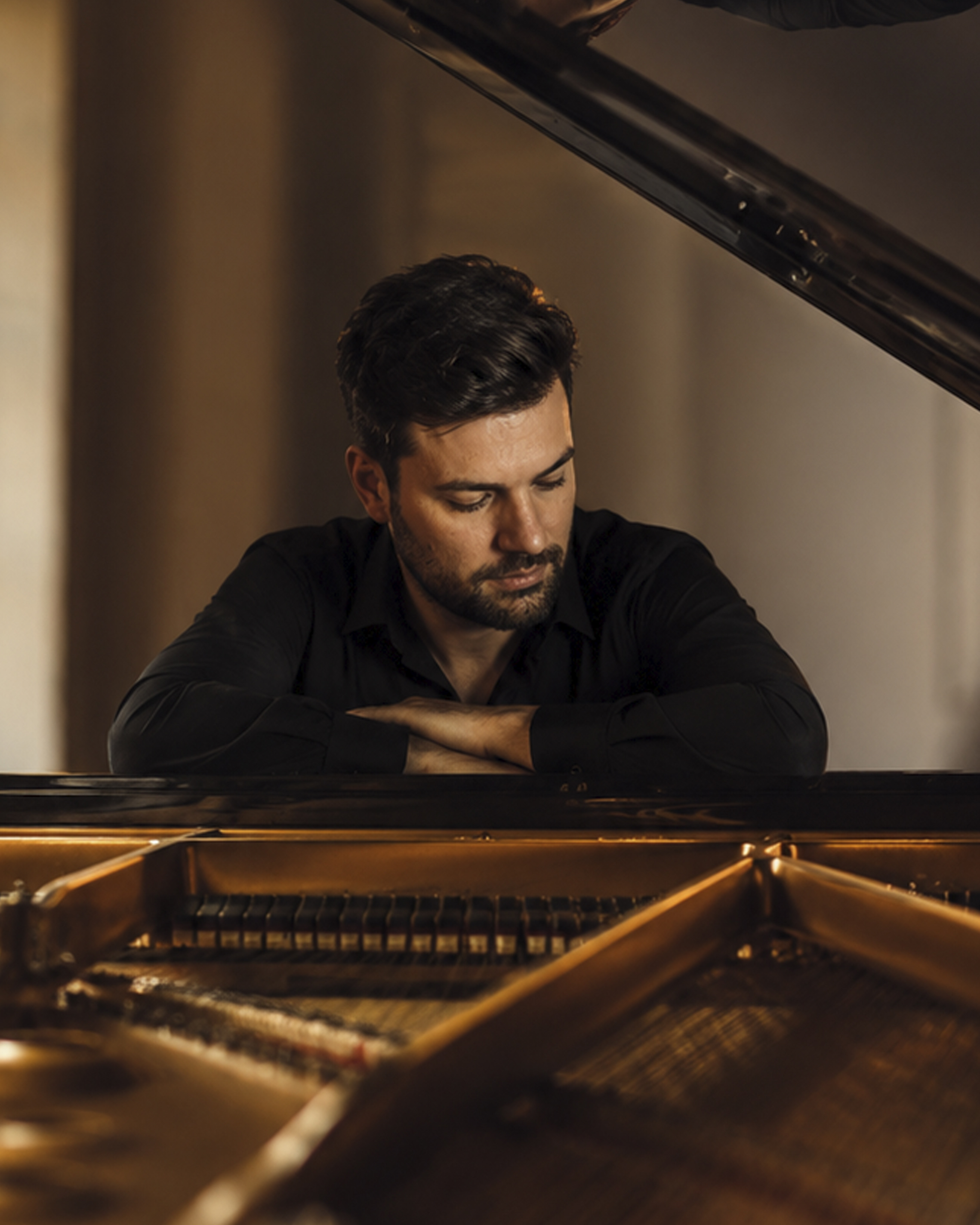 Adam Gravelle performing at a formal piano recital